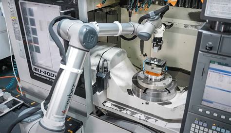 cobots in manufacturing cnc machine tending|moving cobot between cnc machines.